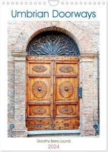 The front page of an A4 calendar showing a beautiful wooden Italian doorway. Has the words Umbrian Doorways, Dorothy Berry-Lound, 2024.