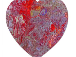 A heart shaped jigsaw puzzle with a red marbled design