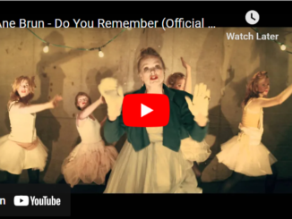 The introductory screen to a Youtube Video by Ane Brun Do You Remember (Official Video). It shows a number of dancers and a singer standing in front of them.